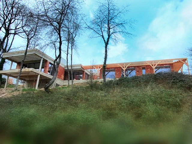 A2MT BAT - Construction d’une villa moderne de 230 m², pose d’une pergola en bois, enduit et bardage à venir - 